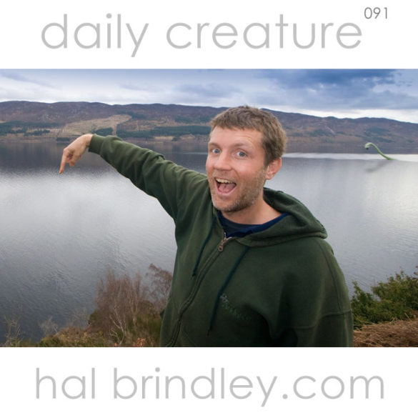 Loch Ness Monster (Plesiosaurus bullcrapius), appears mysteriously behind wildlife photographer Hal Brindley. Loch Ness, Scotland