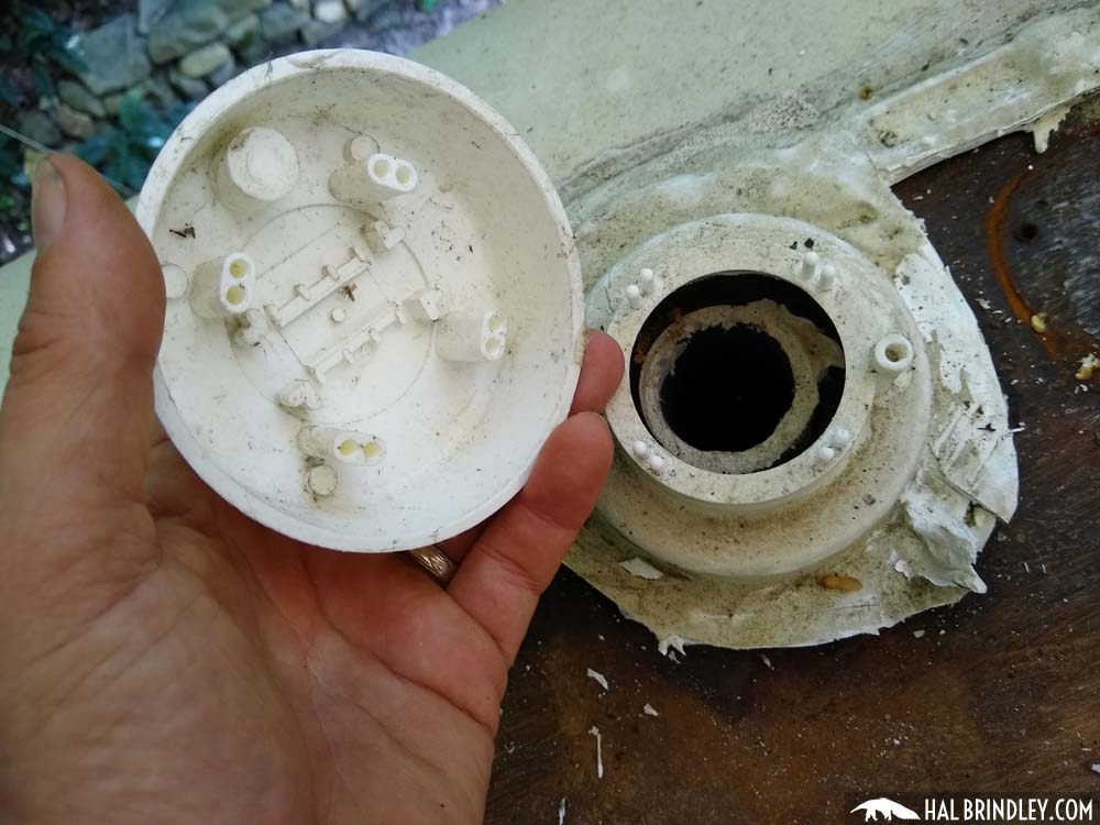 cap removed from plumbing vent cover on camper roof