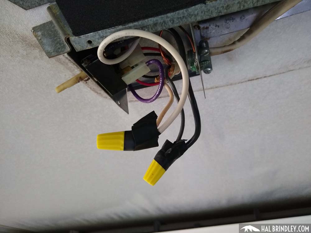 exposing the power supply wiring in the RV rooftop AC