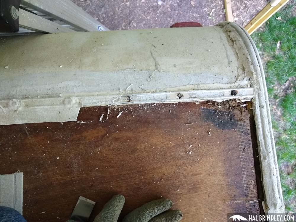 Scraping sealant off RV trim