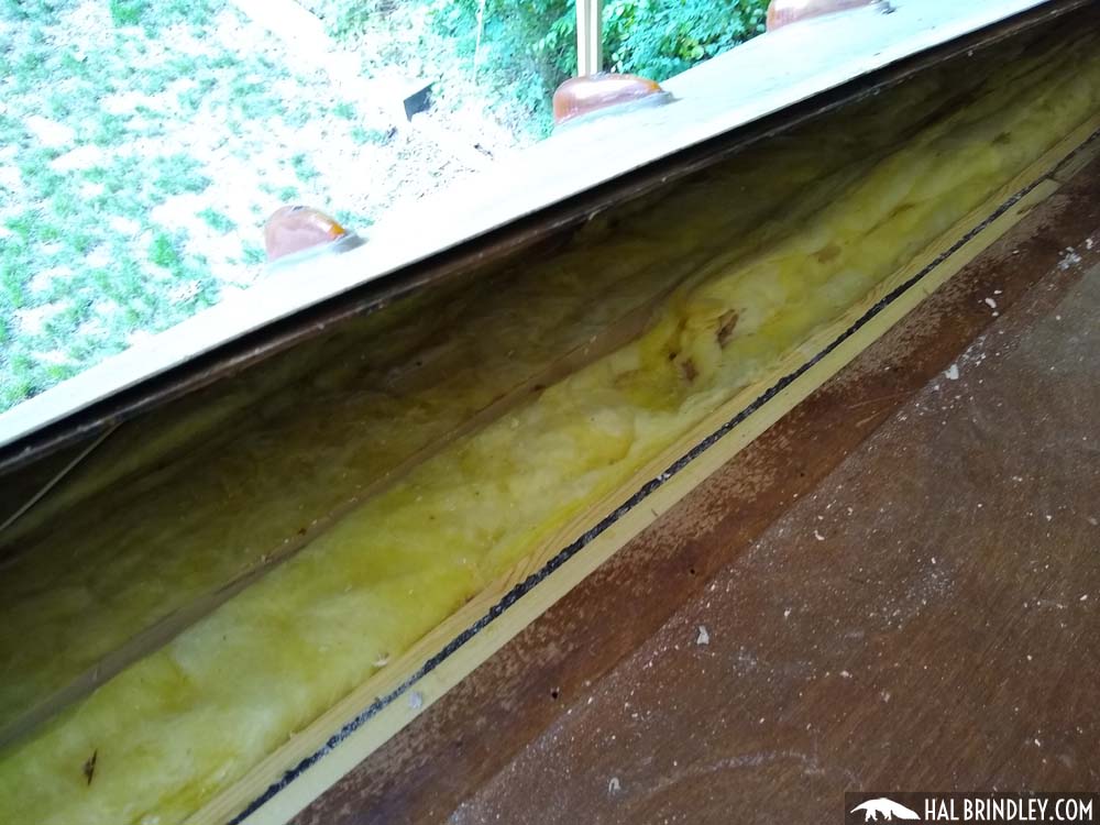 edge of rv roof plywood and view of insulation